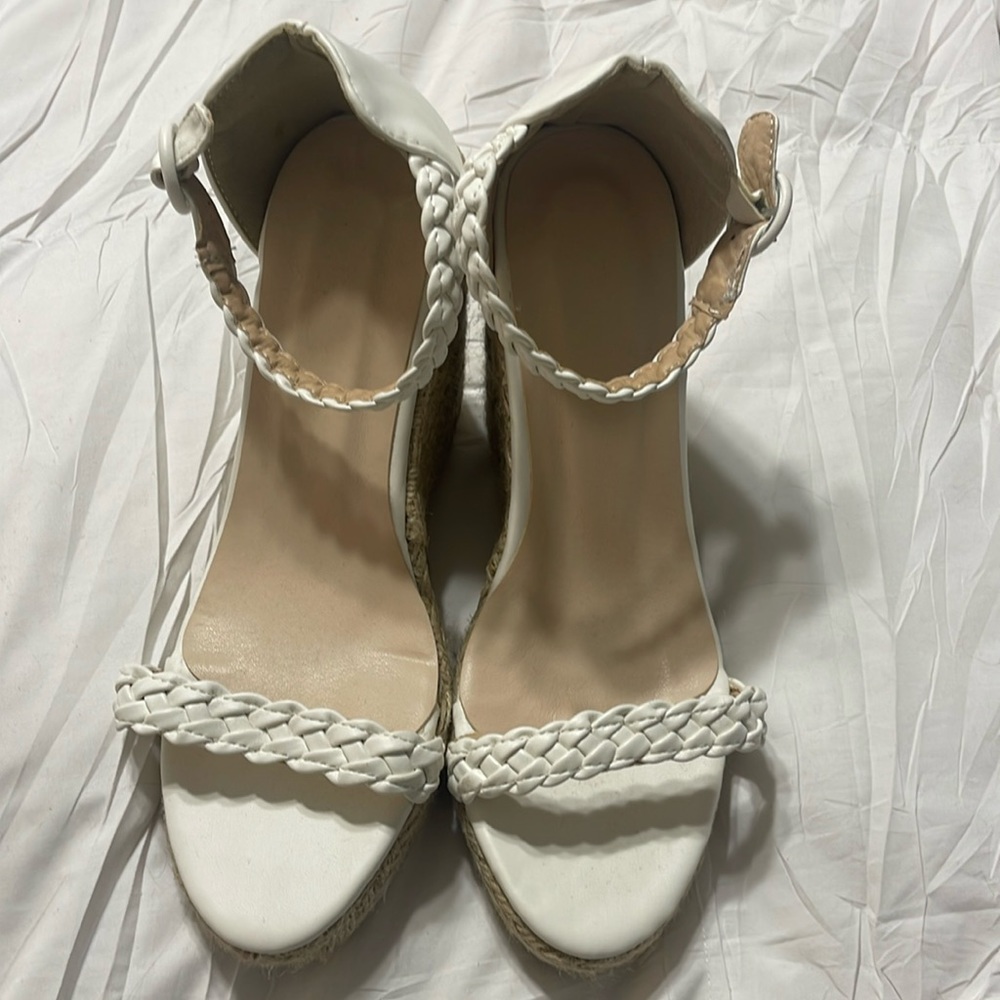 White wedges. European size 42. I generally wear a 9 to 9 1/2 BRAND NEW